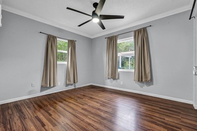 Welcome to this charming 3-bedroom, 2-bath single-family home in - photo 14