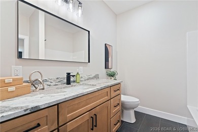 Stunning brand-new lakefront home offering the ultimate in - photo 29