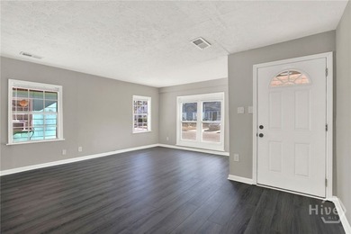 Step inside 406 Mckenzie Place, a well-maintained and updated - photo 3