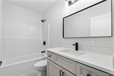 Stunning brand-new lakefront home offering the ultimate in - photo 43