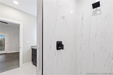 Stunning brand-new lakefront home offering the ultimate in - photo 47