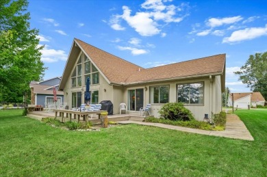 Fantastic waterfront chalet style home on West Canadian Lake - Lake Home Sale Pending in Stanwood, Michigan