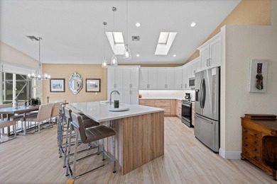Fully renovated and move-in ready, this stunning villa offers - photo 8