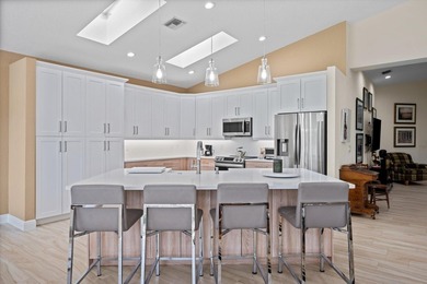 Fully renovated and move-in ready, this stunning villa offers - photo 9