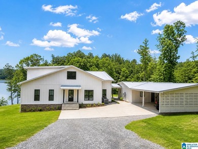 Experience luxury lakefront living in this stunning custom-built - photo 2