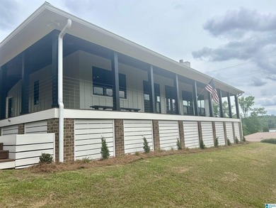 Experience luxury lakefront living in this stunning custom-built - photo 8