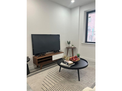 The brand-new luxury condo building in Borough Park features an - photo 12