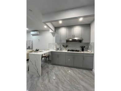 The brand-new luxury condo building in Borough Park features an - photo 13