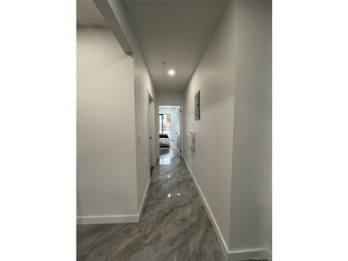 The brand-new luxury condo building in Borough Park features an - photo 16