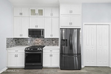 Welcome to Marsh Sound living, where modern upgrades, timeless - photo 8