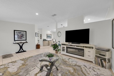 LAND OWNED 2/2 with rare 1 car garage! Nestled on a on a quiet - photo 9
