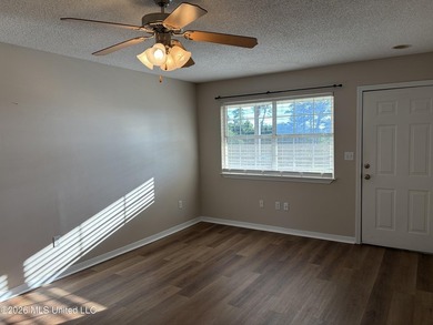 Maintenance free coastal living at its finest! This is a one - photo 2