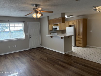 Maintenance free coastal living at its finest! This is a one - photo 3