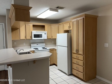 Maintenance free coastal living at its finest! This is a one - photo 5