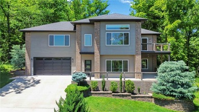 This stunning EAST Facing, LAKE-VIEW home offers a unique and - photo 1