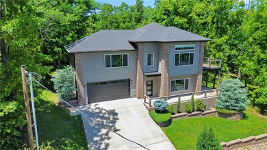 This stunning EAST Facing, LAKE-VIEW home offers a unique and - photo 2