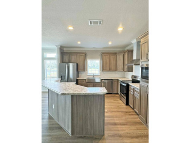 2 Bedrooms | 2 Baths | 1,294 sq ft | + Den Spring Savings! Below - photo 4