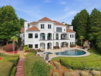 Perched elegantly above Lake Norman's eastern shore and uniquely - photo 39