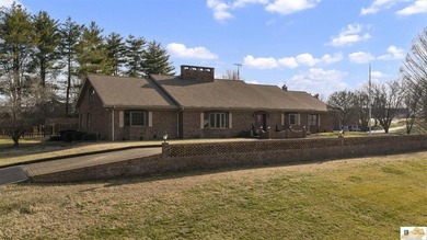 Welcome to this stunning all-brick estate that exudes timeless - photo 3