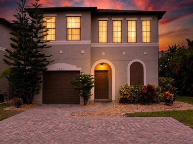 This charming 3 bedroom, 2 1/2 bathroom residence offers high - photo 1