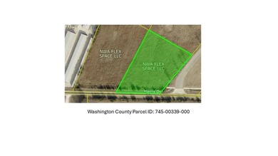 3.25 acres just south of highway 16 in Elkins! Two parcels: - photo 1