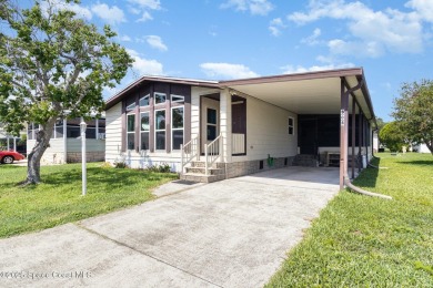Lake Home For Sale in Cocoa, Florida