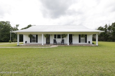 Nestled on five beautiful acres, this versatile property offers - photo 1