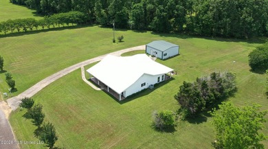 Nestled on five beautiful acres, this versatile property offers - photo 4