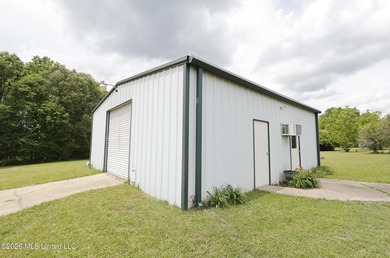 Nestled on five beautiful acres, this versatile property offers - photo 10