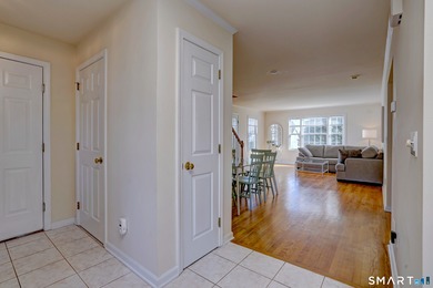 This gorgeous, sun-splashed end-unit townhouse-originally the