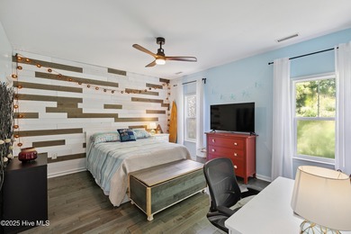 Welcome to this beautifully updated top-floor 2-bedroom, 2-bath