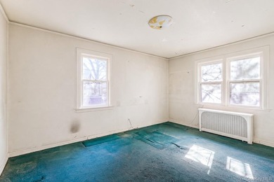 Welcome to this charming semi-detached brick home in the heart - photo 12
