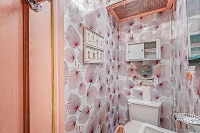 Welcome to this charming semi-detached brick home in the heart - photo 15