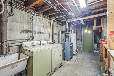 Welcome to this charming semi-detached brick home in the heart - photo 18