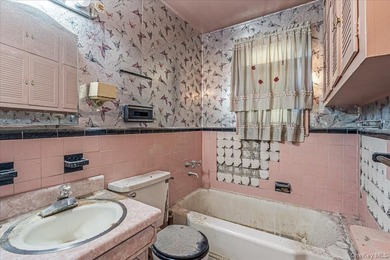 Welcome to this charming semi-detached brick home in the heart - photo 20