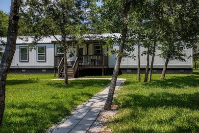 ***PRICE REDUCTION*** Nestled on a serene one-acre lot, this - photo 1