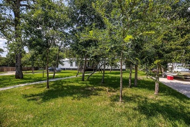 ***PRICE REDUCTION*** Nestled on a serene one-acre lot, this - photo 2
