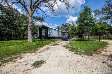 ***PRICE REDUCTION*** Nestled on a serene one-acre lot, this - photo 3