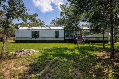 ***PRICE REDUCTION*** Nestled on a serene one-acre lot, this - photo 9