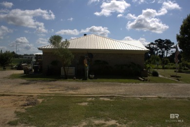 Nestled on the outskirts of Fairhope, this appealing