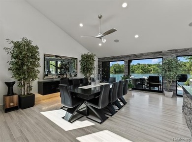A remarkable expression of contemporary lake-area living, this - photo 8