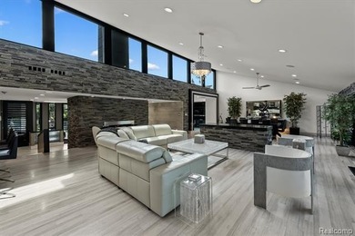 A remarkable expression of contemporary lake-area living, this - photo 9