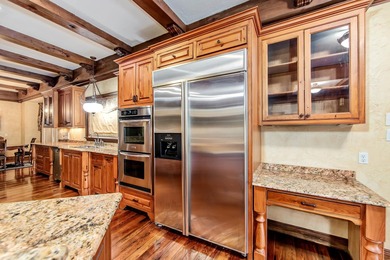 Welcome to a one-of-a-kind luxury estate on over 10 pristine