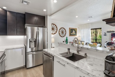 Welcome to this beautifully RENOVATED second-floor condo - photo 3