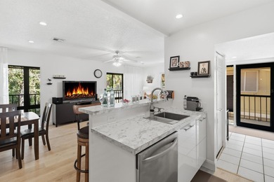 Welcome to this beautifully RENOVATED second-floor condo - photo 7