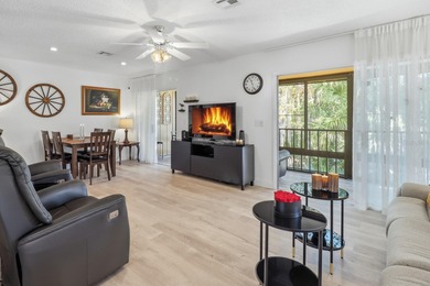 Welcome to this beautifully RENOVATED second-floor condo - photo 9