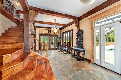 Welcome to a one-of-a-kind luxury estate on over 10 pristine