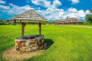 Welcome to a one-of-a-kind luxury estate on over 10 pristine