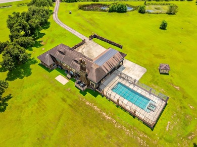 Welcome to a one-of-a-kind luxury estate on over 10 pristine