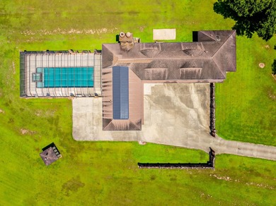 Welcome to a one-of-a-kind luxury estate on over 10 pristine